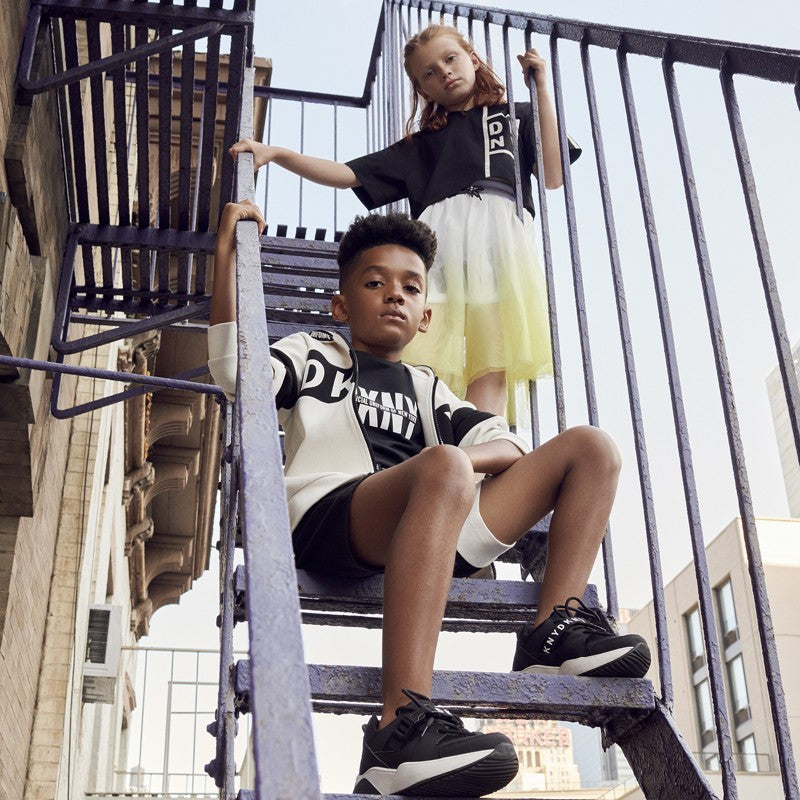 DKNY D33569-60B gelber Rock für Mädchen