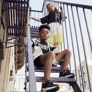 DKNY D33569-60B gelber Rock für Mädchen